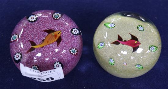 Two Paul Ysart fish paperweights; one pink ground and one beige ground